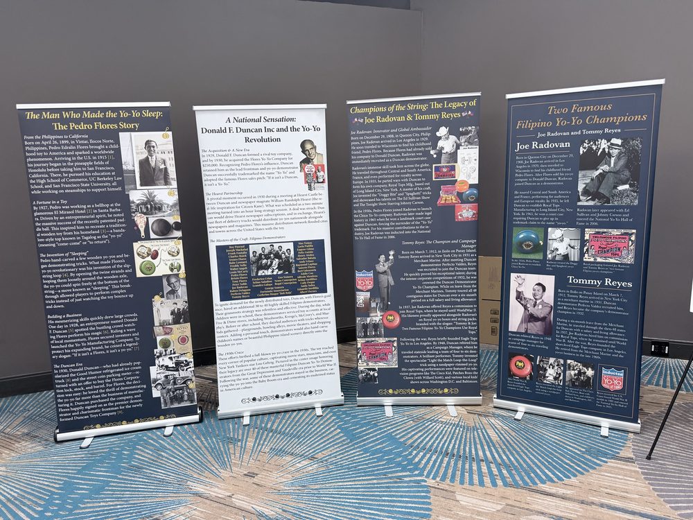 Four roll-up history banners on Pedro Flores, Donald F. Duncan and the Filipino demonstrators, and yo-yo champions Joe Radovan and Tommy Reyes